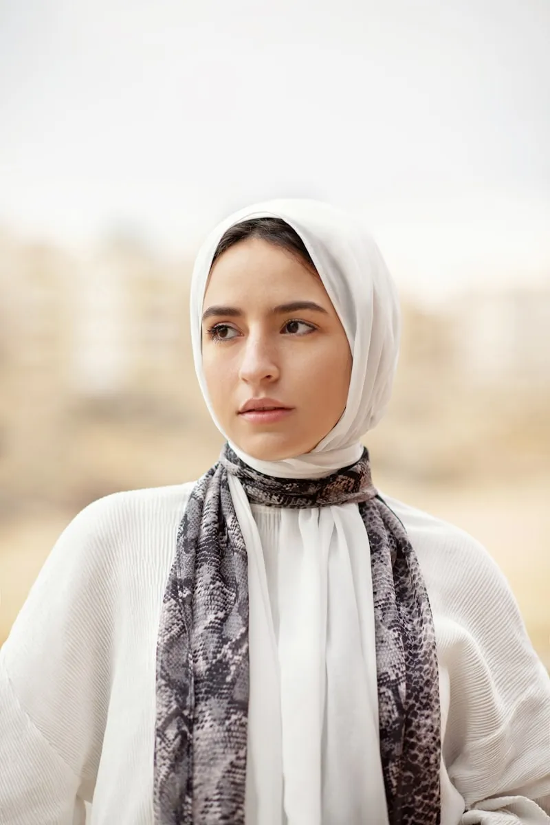 Portrait of woman in white hijab showing natural headshot style