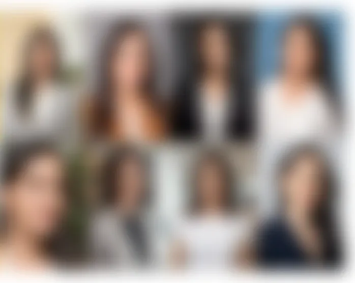 Woman in hijab using laptop to test AI headshot generators